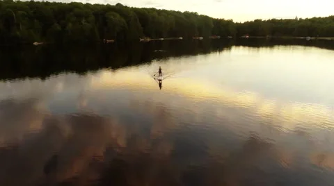 Aerial Sunset fly over Stand Up Paddle Boarder Stockbeeldmateriaal 47742140