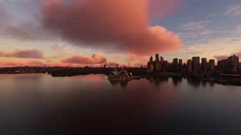 Aerial sunset front view of the Sydney Opera House over the Harbor Bridge Vídeos de archivo 202053995