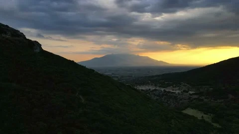 Aerial sunset in middle of mountains Stock Footage 140518543