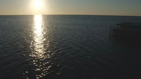 Aerial Sunset Ocean Cabin Video stock 8980274