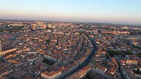 Aerial sunset over Montpellier city. Old mediterranean town drone shot Stock Footage