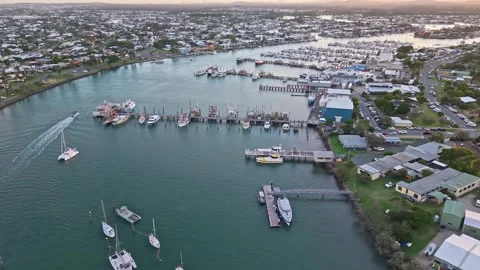 Aerial sunset over Mooloolaba Harbour marina and river channels, Sunshine C.. Stock Footage 333445413