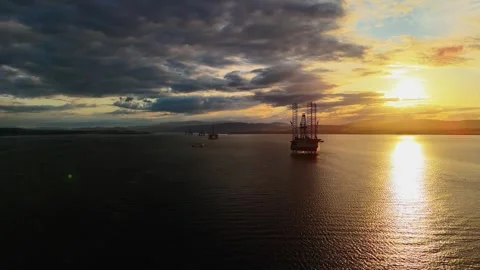 Aerial Sunset Over Oil Platforms in Cromarty Firth Scotland Stock Footage 333202706