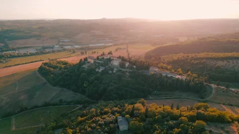 Aerial Sunset Over Rolling Tuscan Vineyards and Countryside Video stock 345604214