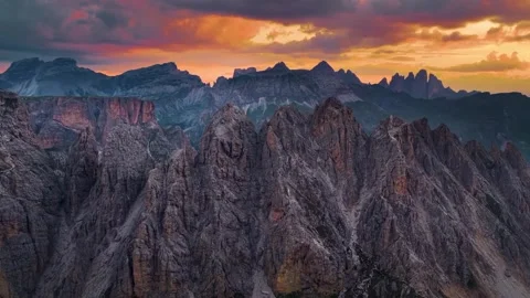 Aerial sunset over rugged mountain peaks in nature Видео 344355072