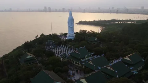 Aerial sunset Panoramic over the distant Da Nang city skyline Stock Footage 323342219