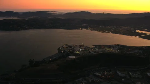 Aerial sunset San Quentin San Francisco Bay USA Stock Footage