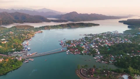 Aerial  sunset of sangkhlaburi district  mon village floating house Thailand Stock Footage 292868596