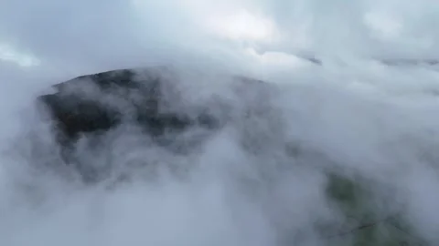 Aerial Sunset Through Clouds Over Countryside Landscape in 4K 60fps Stock Footage 332567193