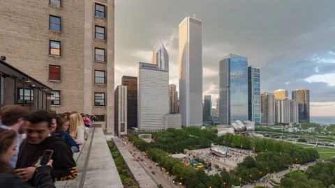 Aerial Sunset timelape of grant park and skyscrapers from rooftop bar Stock Footage 96232653