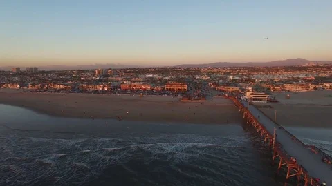 Aerial Sunset View Along the Beach with the Pier in Newport Beach Stock Footage 78490262