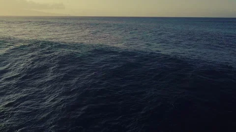 Aerial Sunset View of Big Ocean Waves Breaking Stock Footage 56451815