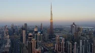 Aerial Sunset View Burj Khalifa Dubai City Skyscrapers Stock Footage