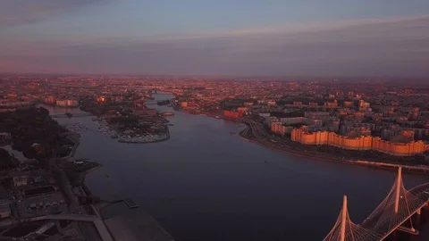 Aerial sunset view cable Bridge ZSD road car rooftops zenit arena Stock Footage 108269899