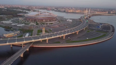 Aerial sunset view cable Bridge ZSD road car rooftops zenit arena water Stock Footage 108270198