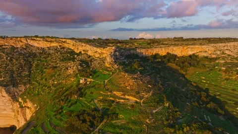 Aerial sunset view of cliffs, sea. Malta island Vídeos de archivo 324801478
