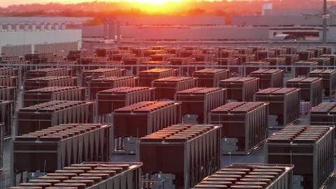 Aerial sunset view of data center in Ashburn, Virginia with rows of industrial Stock Footage 333701300