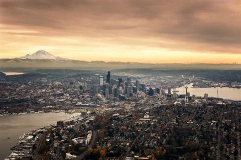 Aerial sunset view of Downtown Seattle, Space Needle and Mt Rainier Stock Photos