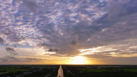 Aerial sunset view with dramatic gray clouds floating over the landscape Stock Footage 344838659