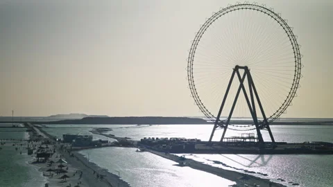 Aerial Sunset View of Ferris Wheel Silhouette over Qarhan Salt Lake Video stock 341906440
