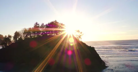 Aerial Sunset View Flying Over Coast with Dramatic Light in the Pacific Northwes Video stock 63013658
