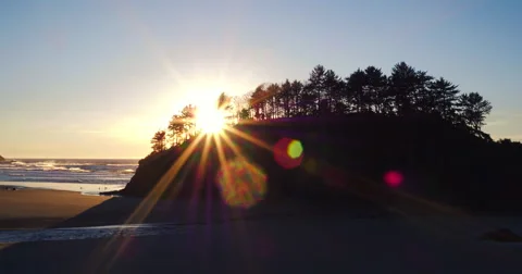 Aerial Sunset View Flying Over Coast with Dramatic Light in the Pacific North Stock Footage 63020188