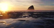 Aerial Sunset View Flying Over Coast With Dramatic Light In The Pacific North Stock Footage