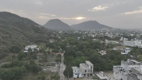 Aerial Sunset View of Jamini Kund Road with Flying Pigeons Stock-Footage 321544580