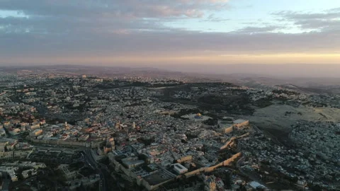 Aerial Sunset View of Jerusalem Old City in fast speed Stock Footage 325050509