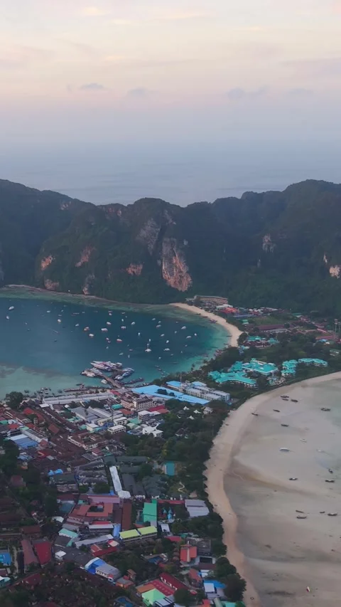 Aerial sunset view of Koh Phi Phi island bay with boats Thailand Stock Footage 334088237