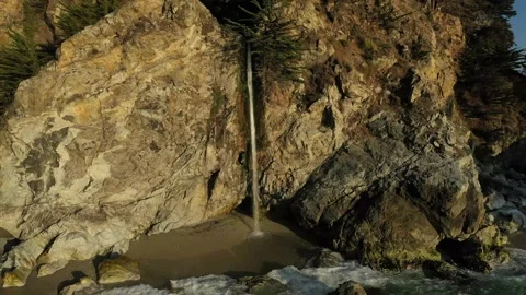 Aerial sunset view, McWay Falls Big Sur California, 4K Video stock 137920573