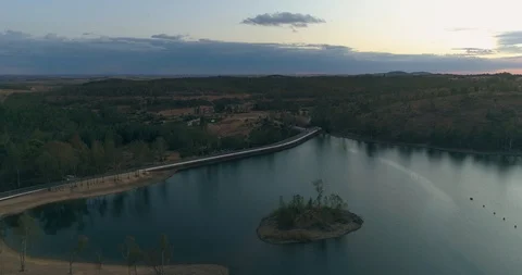 Aerial sunset view of Mina de São Domingos, Beach lagoon, Portugal. (E) Stock Footage 116444989