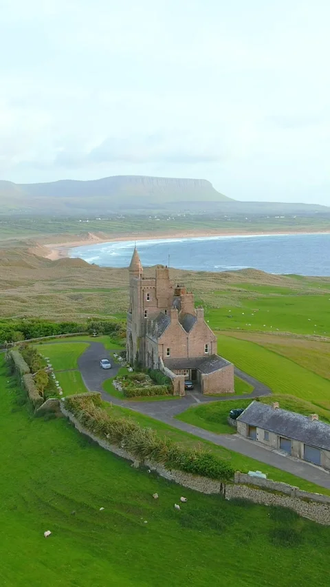 Aerial sunset view of Mullaghmore Head and Classiebawn Castle. Co Sligo, Ireland 스톡 동영상 301223957
