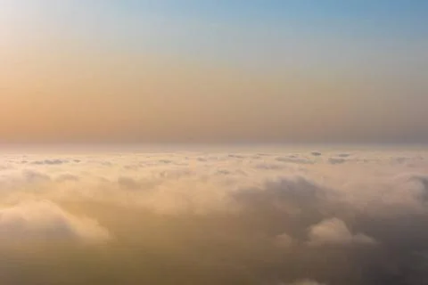 Aerial sunset view over the cloud facing the sun. Colorful aerial sunset v... Foto stock