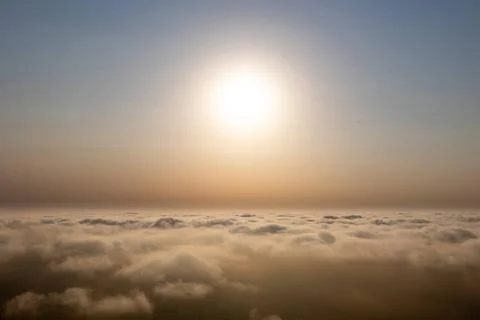 Aerial sunset view over the cloud facing the sun. Colorful aerial sunset v... Foto stock