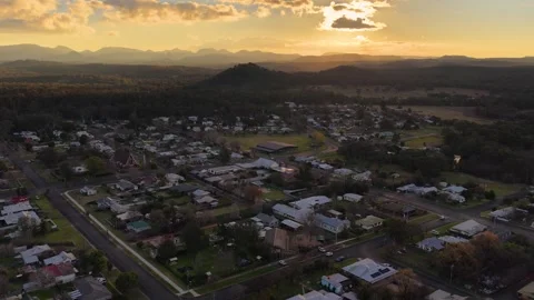 Aerial Sunset View Over Coonabarabran Township and Distant Mountains Stock Footage 340319219