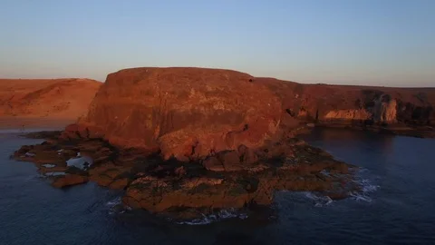 Aerial Sunset view on Playa De Papayago Cliffs, Lanzarote, Canary Islands, Spain Stock Footage 123470863