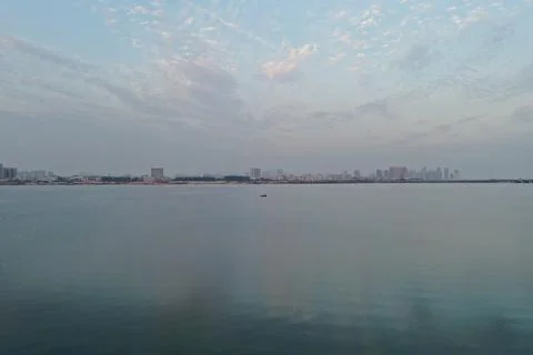 Aerial Sunset View of River Bridge and City Skyline in Xiamen Stock Photos