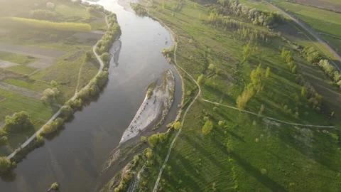 Aerial Sunset view of Struma river passing near village of Topolnitsa, Bulgaria Stock Footage 188516908