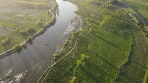 Aerial Sunset view of Struma river passing near village of Topolnitsa, Bulgaria Stock-Footage 199948860