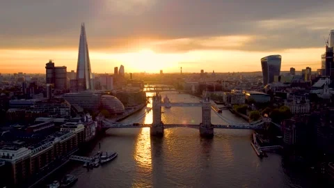 Aerial sunset view of the Tower Bridge and skyline of London Stock Footage 266130068