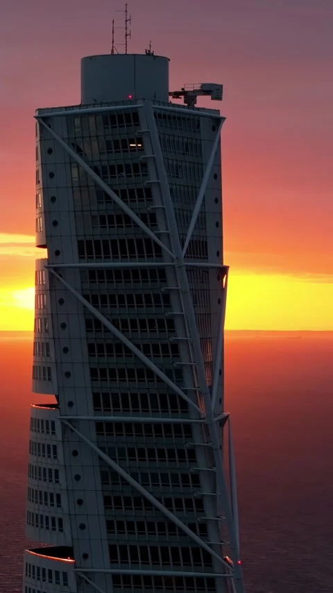 Aerial sunset view of Turning Torso skyscraper in Malmo Sweden with dramati.. Stock Footage 339650388