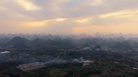 Aerial Sunset View of Yangmeiling Karst Mountains in Yangshuo, Guilin, China Stock Footage 326393642