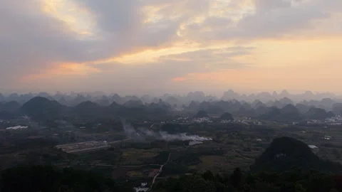 Aerial Sunset View of Yangmeiling Karst Mountains in Yangshuo, Guilin, China Stock Footage 326707901