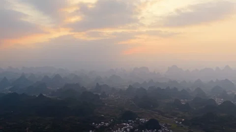 Aerial Sunset View of Yangmeiling Karst Mountains in Yangshuo, Guilin, China Stock Footage 326707946
