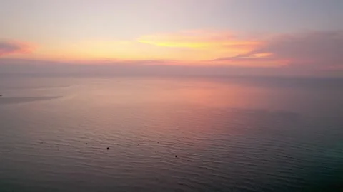 Aerial sunset views over ocean, evoking peace. Stock photography,purple colors Stock Footage 279172000