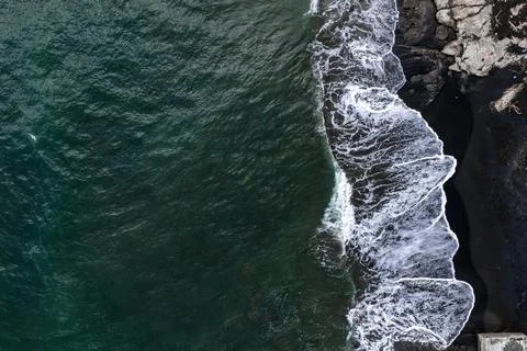 Aerial surf patterns on black sand coast near Kamakura, Japan Stock Photos