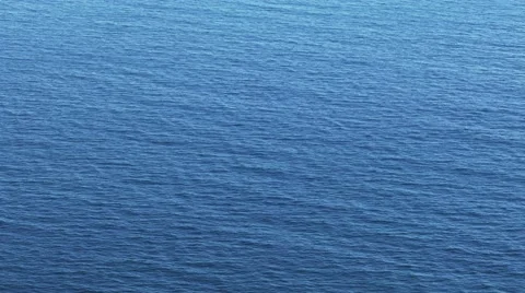 AERIAL: Surface of the blue sea Stock Footage 68377112