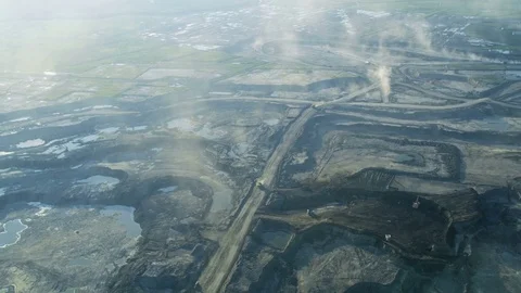 Aerial surface mining Athabasca oil sands Fort McMurray Stock Footage 80034908