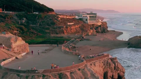 Aerial: Sutro Baths and Point Lobos at sunset. San Francisco. California,  USA Stock Footage 162195174